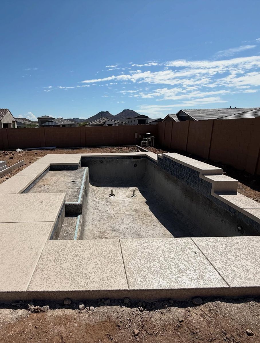 Same pool with finished textured deck