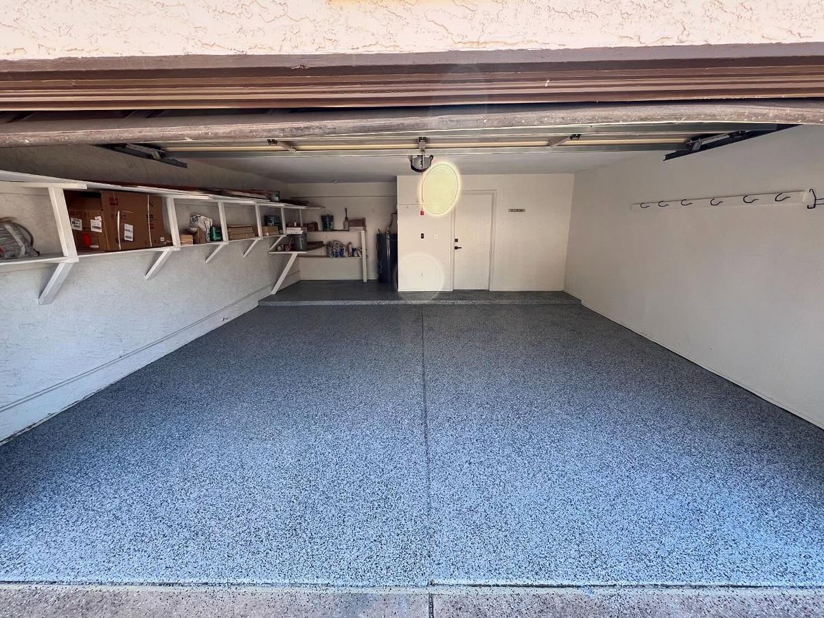Finished gray and blue flake garage floor