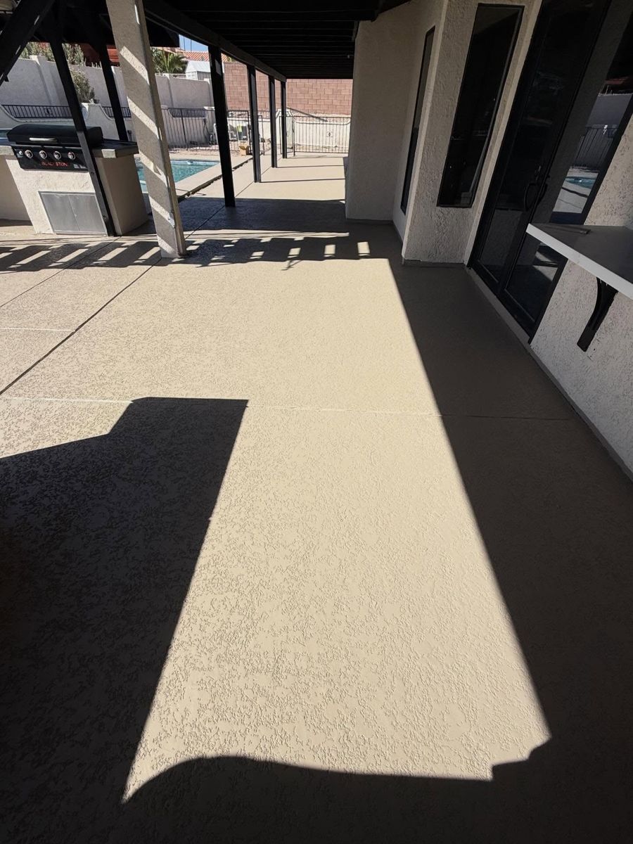 Covered patio and walkway finished in a sand-tone textured coating